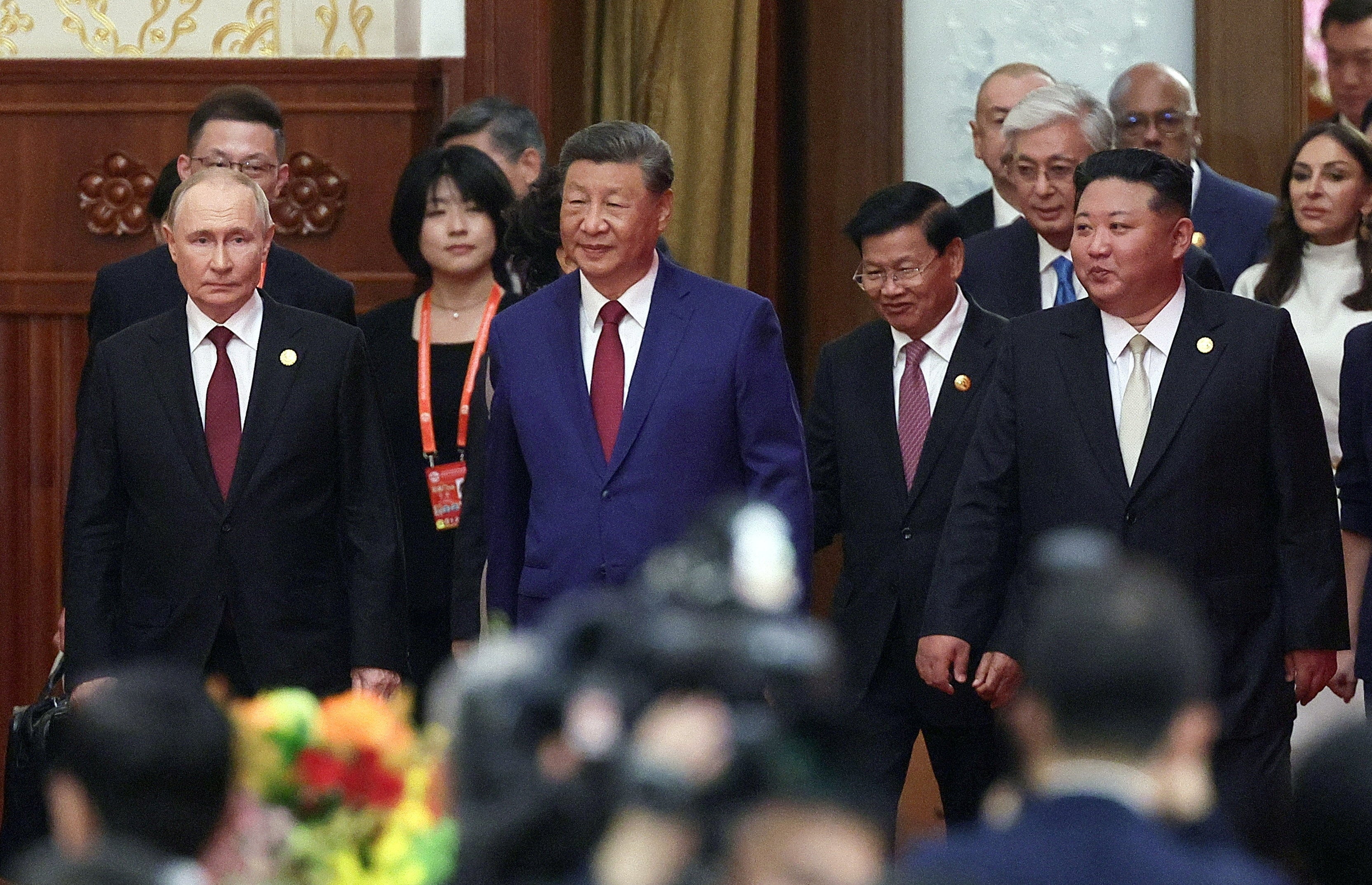 Russian president Vladimir Putin, Chinese president Xi Jinping and North Korean leader Kim Jong Un arrive to attend a reception marking the 80th anniversary of the end of the Second World War in Beijing
