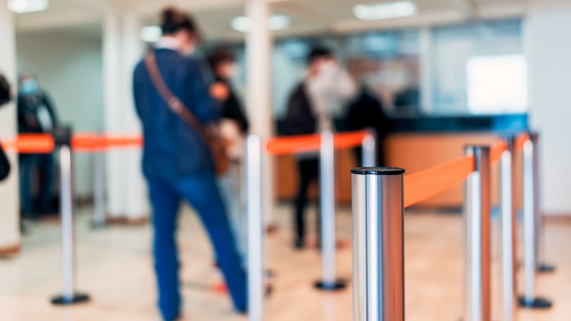 Three held on suspicion of human trafficking after a vulnerable older person tried to withdraw large amount of cash from building society