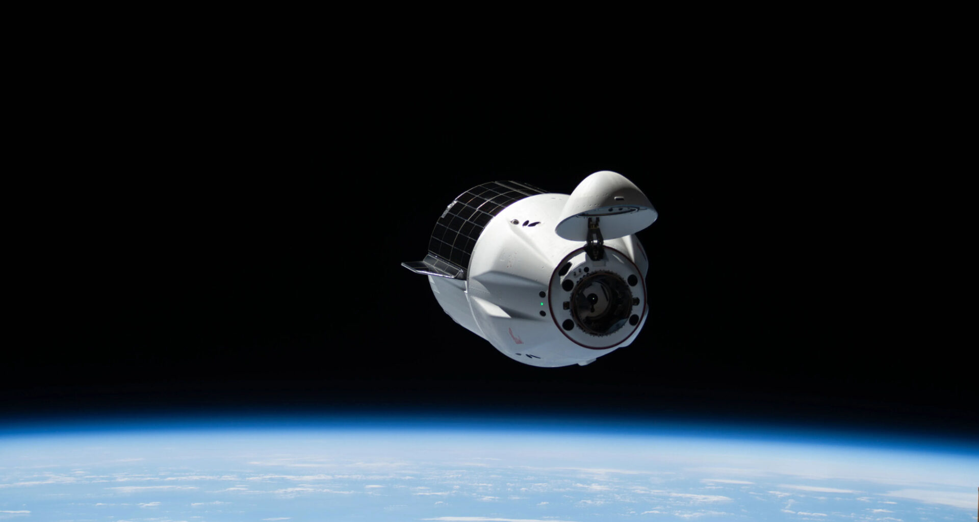 SpaceX's CRS-33 Dragon cargo spacecraft makes its final approach to the International Space Station during its docking on Aug. 25, 2025. The same spacecraft was used for a reboost demonstration of the orbiting complex on Sept. 3, 2025.