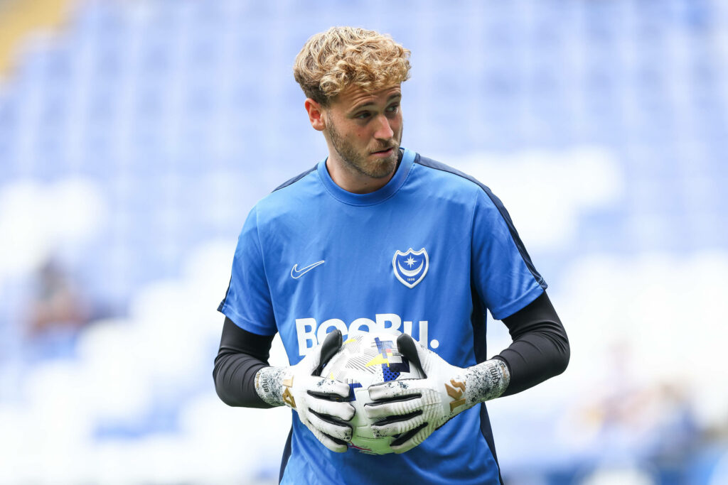 Nicolas Schmid holding a football