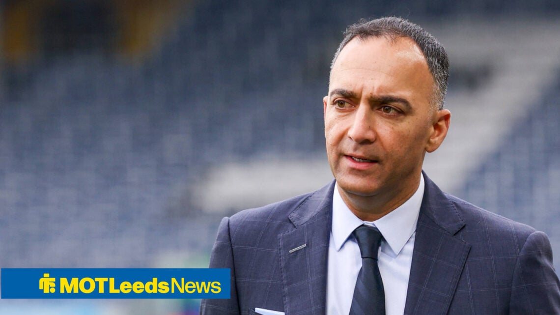 Leeds chairman Paraag Marathe looks to his right