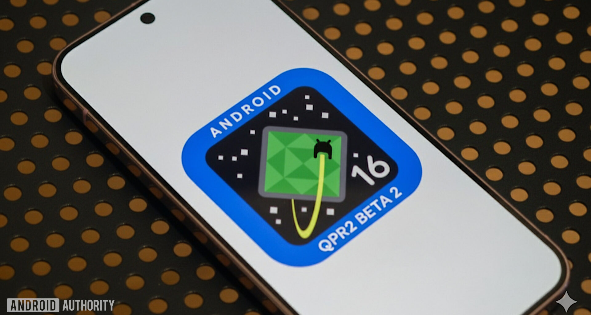 Photo of Android 16 QPR2 Beta 2 logo on a Pixel phone