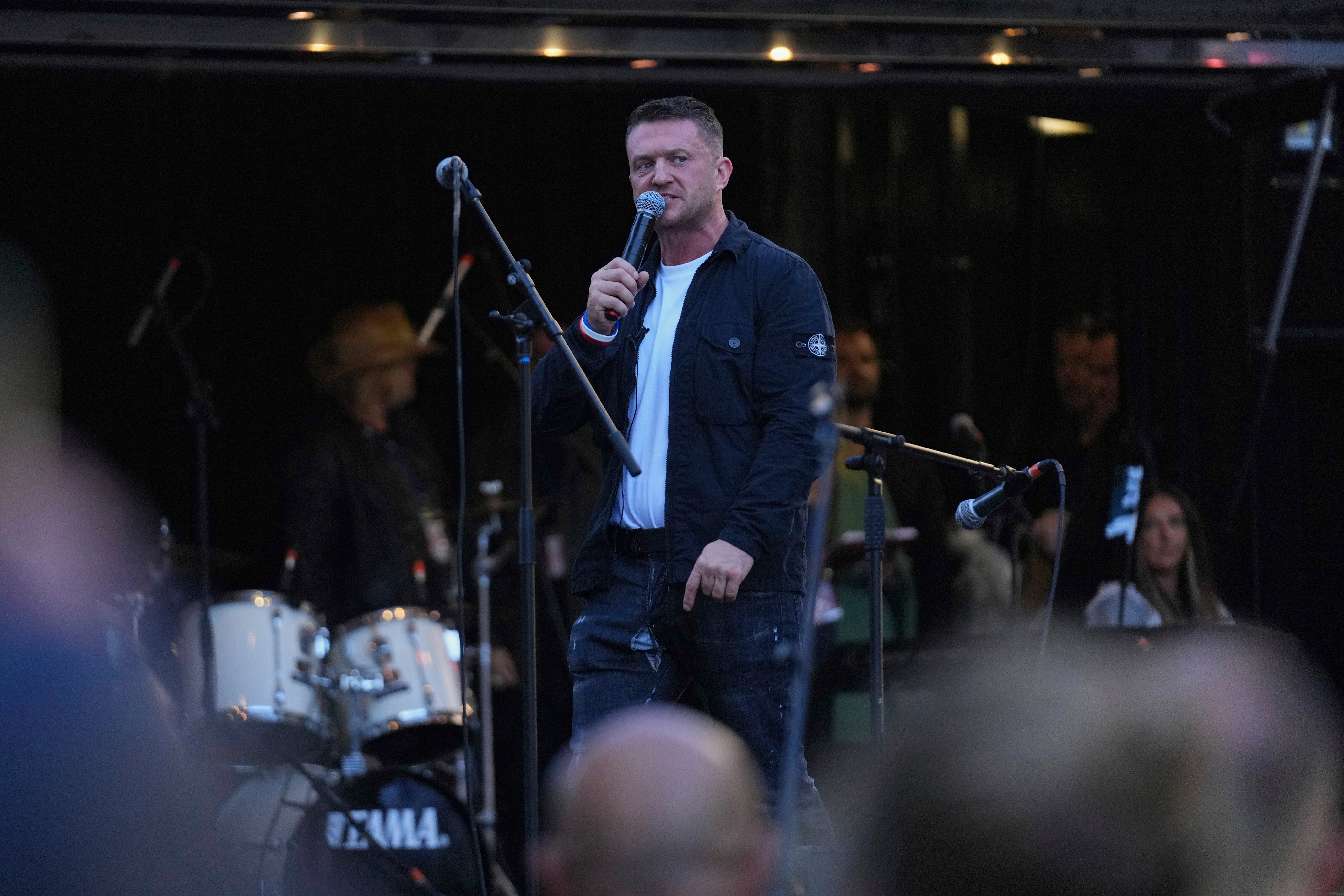 Tommy Robinson speaks during the Unite the Kingdom march, which was attended by 110,000 people