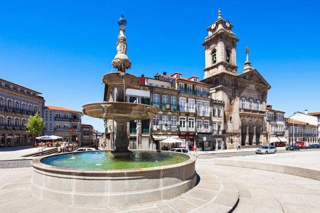 GUIMARAES, PORTUGAL - JULY 11: Toural Square (Largo do Toural) is one of the most central and important squares on July 11, 2014 in Guimaraes, Portugal