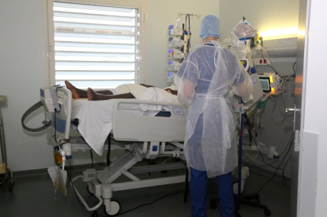 A medical staff works in a room in the COVID-19 department of Mamoudzou hospital (CHM.