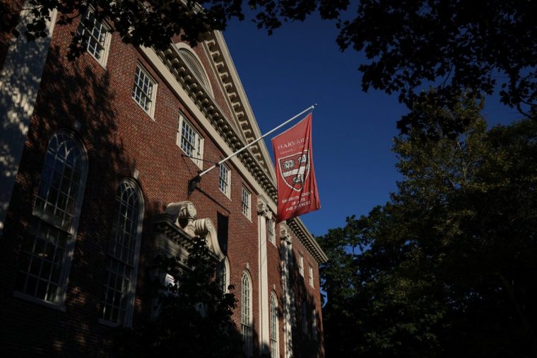 A flag hangs on campus at Harvard University in Cambridge, Massachusetts, U.S., September 4, 2025. REUTERS/Shannon Stapleton