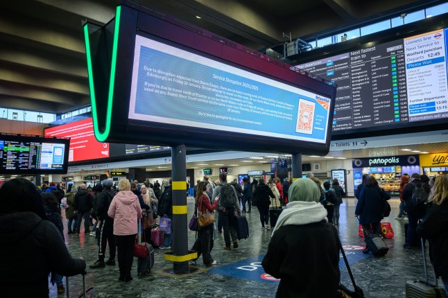 LONDON< UNITED KINGDOM - JANUARY 24: Digital display boards in Euston Station announce major disruption to train services due to Storm Eowyn on January 24, 2025 in London, United Kingdom. The Met Office has issued rare red Warnings for wind for Northern Ireland as well as central and southwestern areas of Scotland. These are accompanied by wider Amber and Yellow Warnings for wind, as well as Yellow Warnings for rain and snow across the UK. (Photo by Leon Neal/Getty Images)