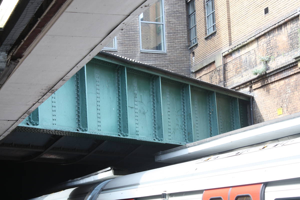 The green culvert in which the River Westbourne can be found at Sloane Square station