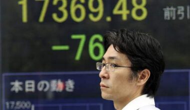 Asian stock markets rise mid-morning on Fed rate-cut hopes, corporate developments
