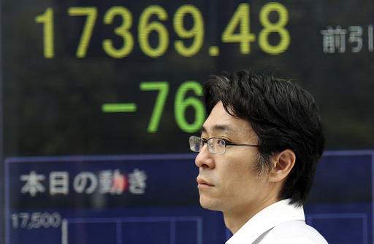 Asian stock markets rise mid-morning on Fed rate-cut hopes, corporate developments