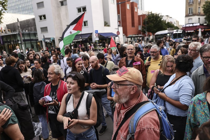 People participate in a spontaneous rally following the rejection of the vote of confidence requested by former prime minister François Bayou, in Montreuil, Paris, on Monday.  Photograph: EPA