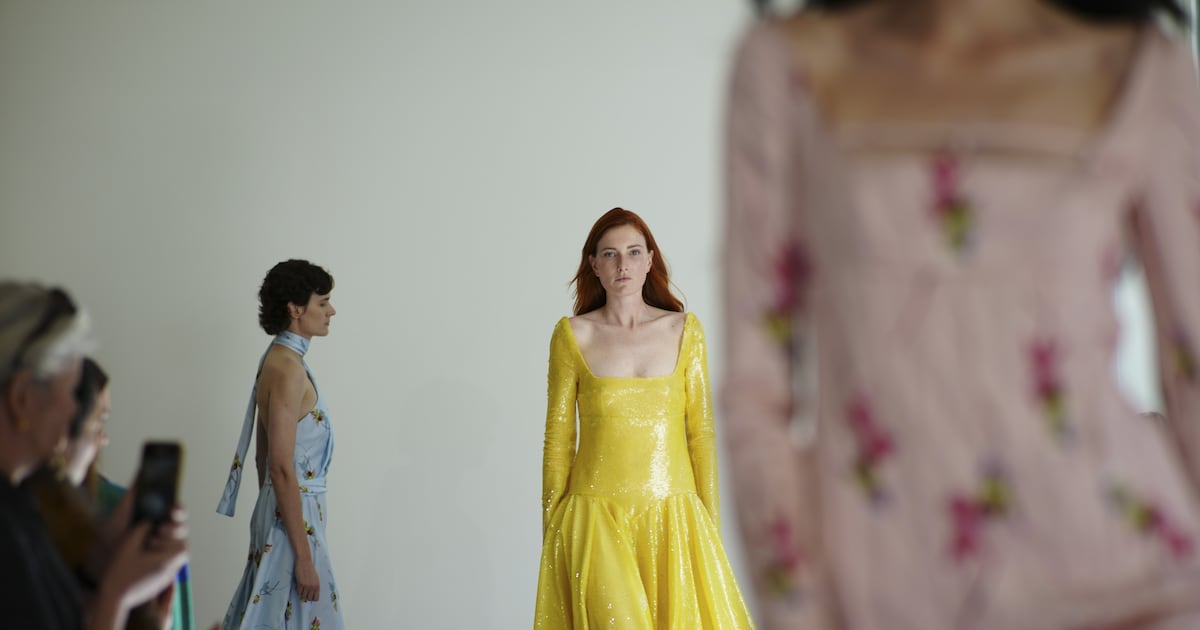 Royal favourite Emilia Wickstead trades demure daywear for bold colour and balloon hems – The Irish News