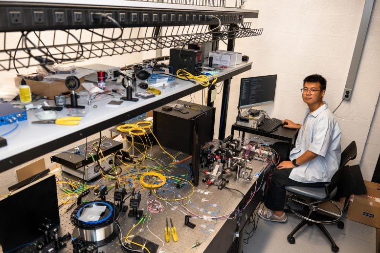 Yichi Zhang Working With Fiber Optic Cables