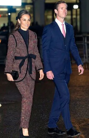 Mark Cuthbert/UK Press via Getty Pippa Middleton and James Matthews at the Together at Christmas carol service at Westminster Abbey on Dec. 8, 2023.