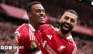 Liverpool score twice in the first half to overcome Everton in the Merseyside derby at Anfield.