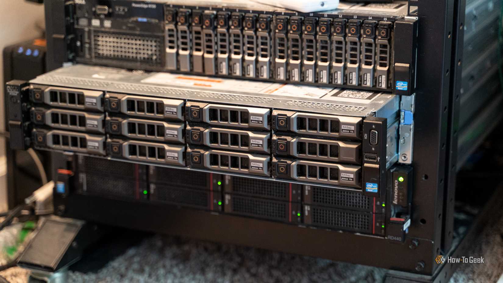 A rack-mount server slid out of the rack slightly with other servers above and below it.