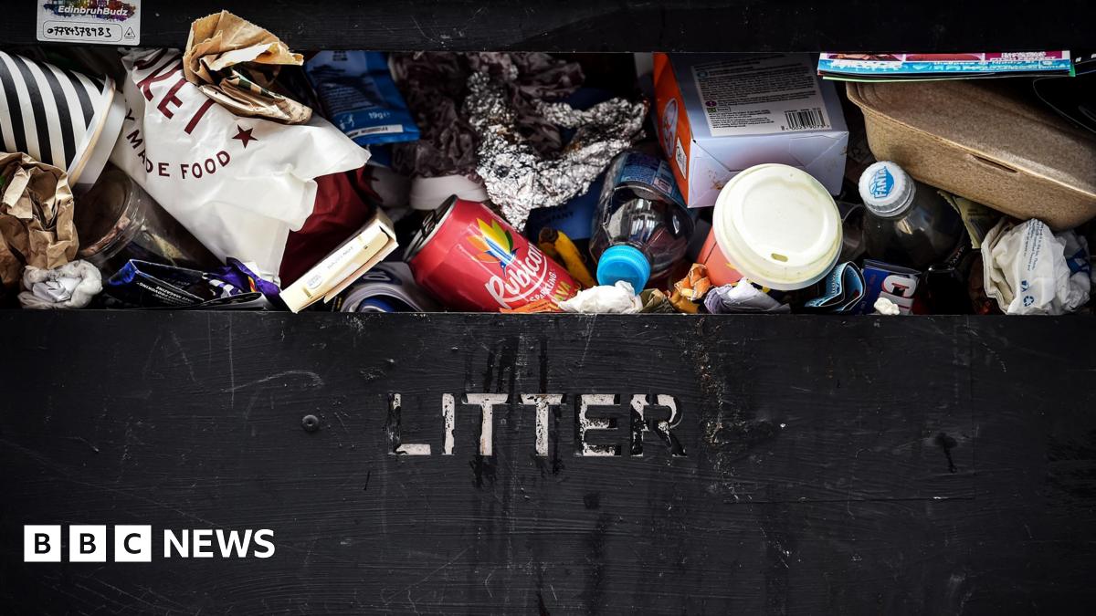 An overflowing rubbish bin