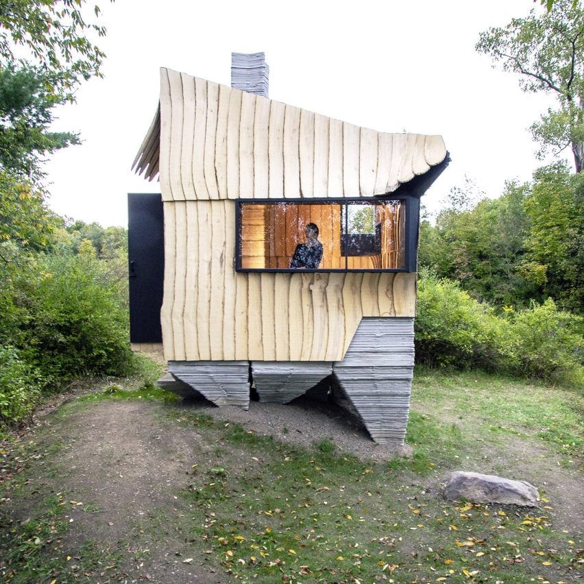 Rough-sawn timber facade of Ashen Cabin by Hannah