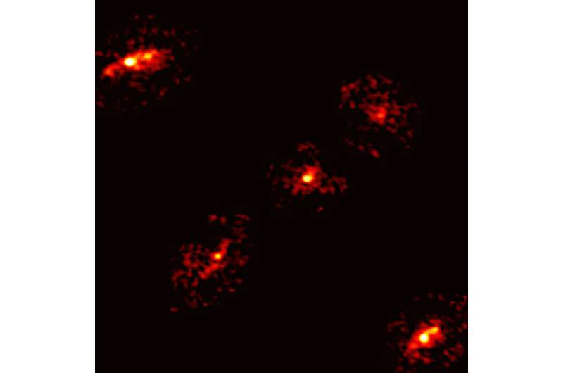 A rare cosmic configuration: An Einstein Cross with five points of light, instead of the usual four, has been discovered by scientists. Credit: Nicolás Lira Turpaud (ALMA Observatory) & adapted from Cox et al. 2025 Astronomers discover rare einstein cross with fifth image, revealing hidden dark matter