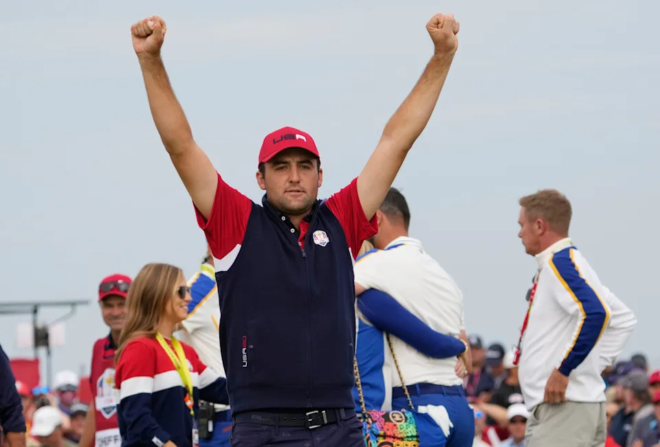 Team USA player Scottie Scheffler celebrates winning against Team Europe player Jon Rahm on the 15th green during day three singles rounds for the 43rd Ryder Cup golf competition at Whistling Straits. (Photo: Michael Madrid-USA TODAY Sports)
