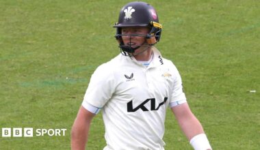 Ollie Pope walks off the field