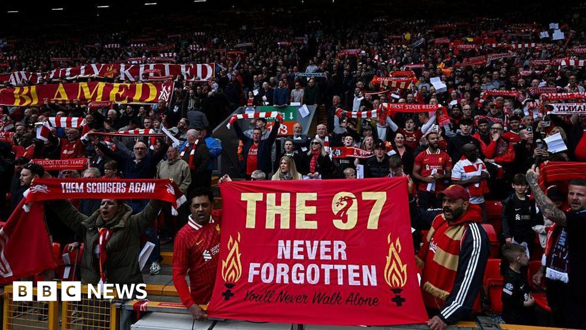 Liverpool's supporters hold banners reading messages paying a tribute to the victims of the Hillsborough disaster at the start of the English Premier League football match between Liverpool and West Ham United at Anfield in Liverpool, north west England on April 13, 2025.