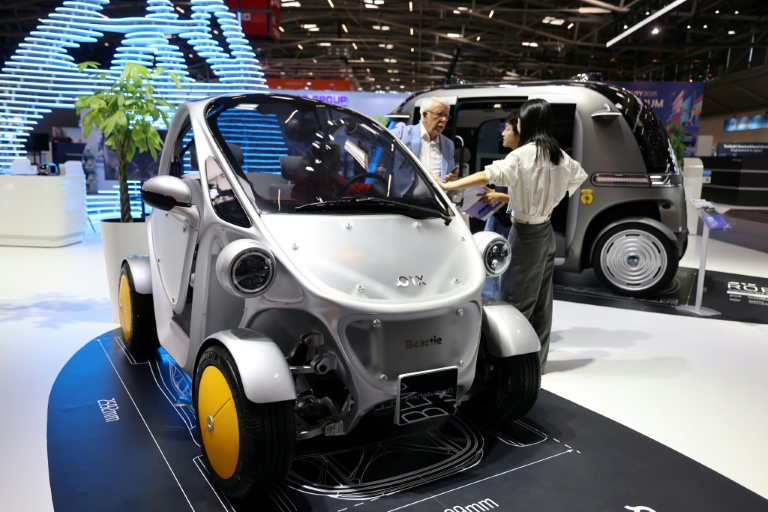 Merz ramps up pressure on EU over electric car shift