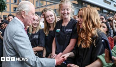 The King with nurses at at the opening of a new hospital in Smethwick