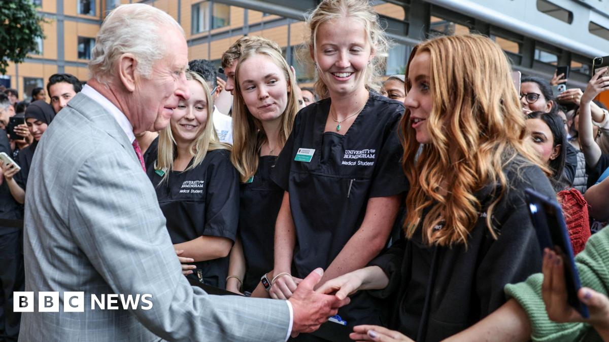 The King with nurses at at the opening of a new hospital in Smethwick