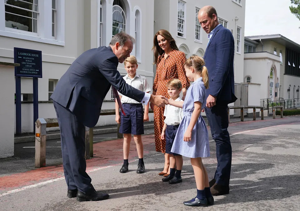 Prince George, Kate Middleton, Prince Louise, Princess Charlotte and Prince William meeting the headmaster on the first day of school
