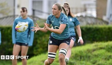 Zoe Aldcroft carries the ball