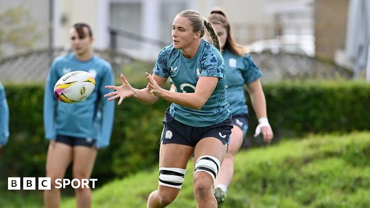 Zoe Aldcroft carries the ball