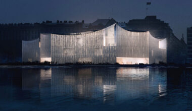 textured glass skin forms into curved roof for cossement cardoso's helsinki museum