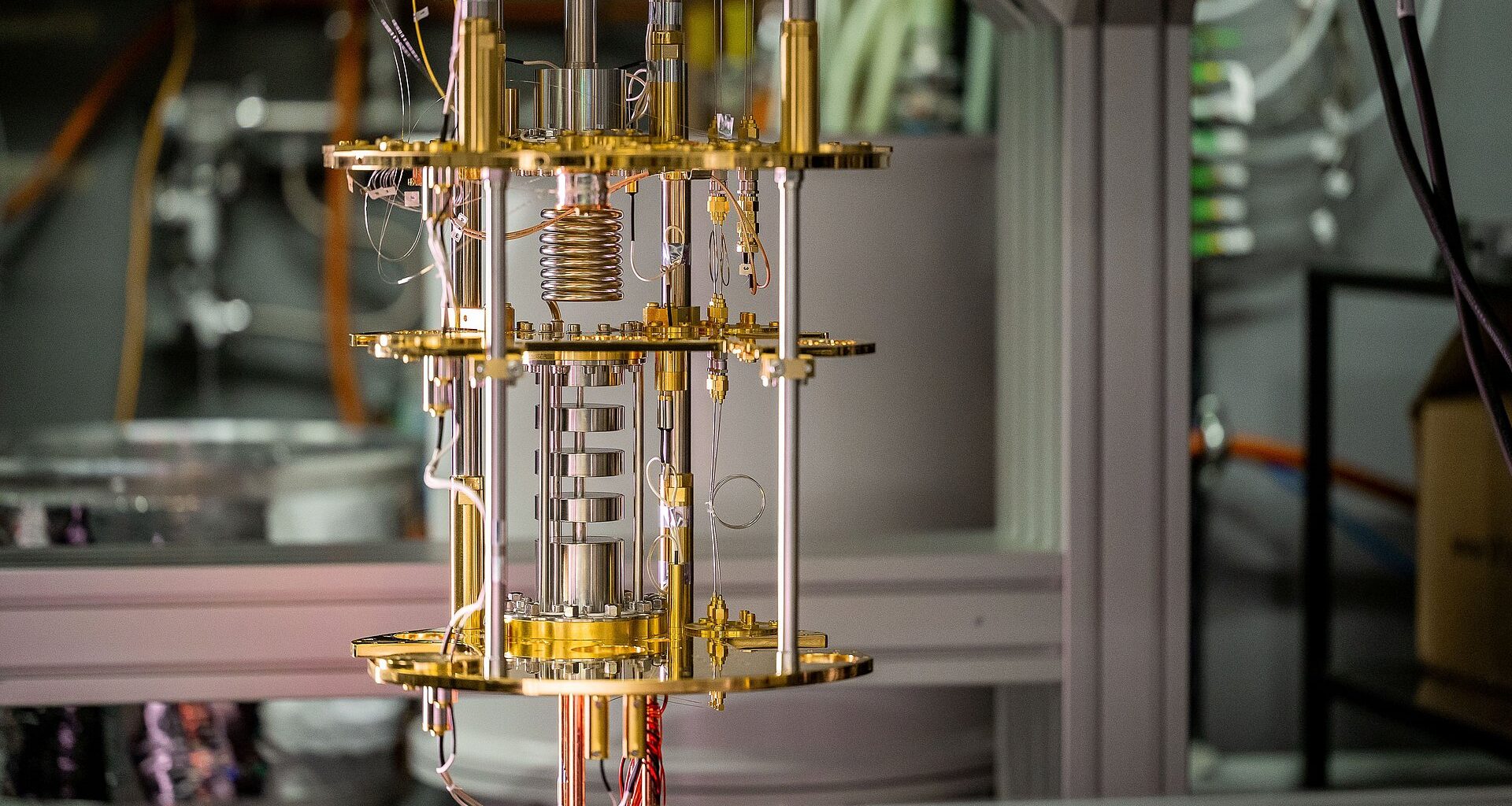 The image shows the cooling structures of an open quantum computer.