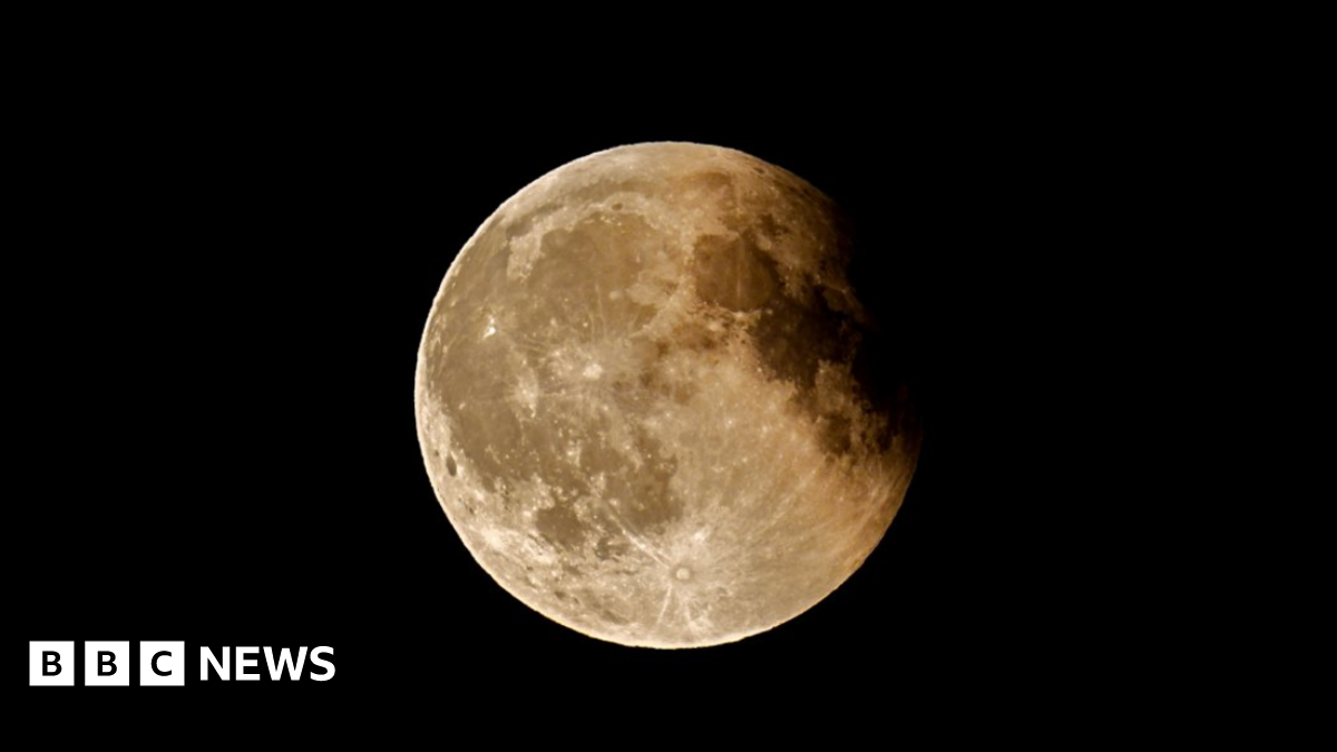 The total eclipse 'Blood Moon' over Liverpool last night which looks more orange than red