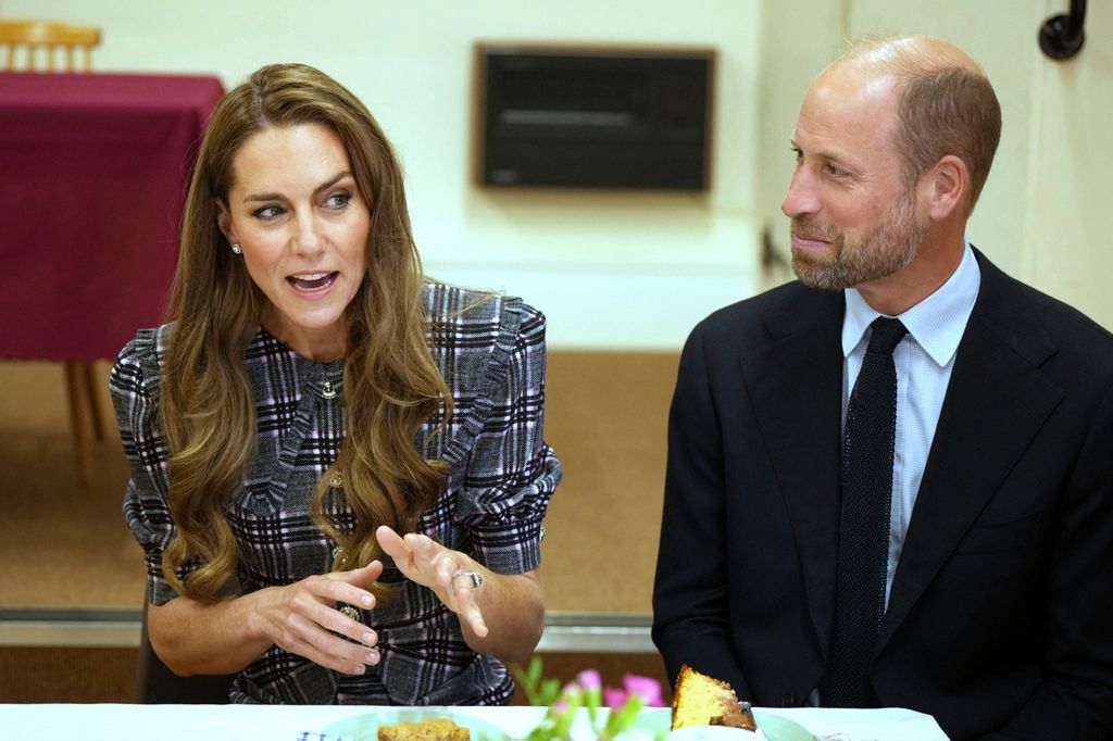Britain's Catherine, Princess of Wales and Britain's Prince William, Prince of Wales visit the National Federation of Women's Institute (WI) in Sunningdale, west of London on September 8, 2025, to commemorate the three-year anniversary of the death of William's late grandmother Queen Elizabeth II. The Prince will meet with members from Sunningdale WI there and across Berkshire to hear about the work of the WI and how it gives opportunities for women to socialise, learn new skills and engage in community projects. (Photo by Alastair Grant / POOL / AFP) (Photo by ALASTAIR GRANT/POOL/AFP via Getty Images)          