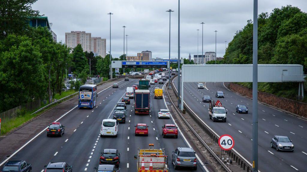 Cars streaming along a stretch of the M8 in Glasgow