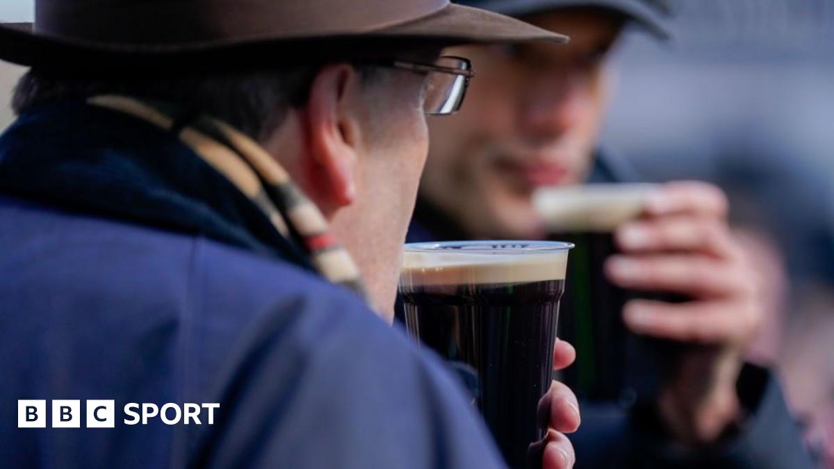 Racegoers at Cheltenham enjoying a pint