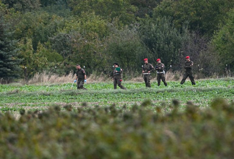 epa12389292 Police officers and soldiers work at the site of suspected remnants of a Polish missile found in Choiny village, eastern Poland, 19 September 2025. The remains of what are most likely a Polish missile that was launched to shoot down a Russian drone were found in the eastern village of Choiny. Overnight from 09 to 10 September 2025, Russian drones repeatedly violated Polish airspace during a major aerial attack on Ukraine, which Warsaw described as a provocation. The incident prompted Poland and its NATO allies to scramble fighter jets, and Poland said that the drones posing a direct threat were shot down that night. EPA/WOJTEK JARGILO POLAND OUT
