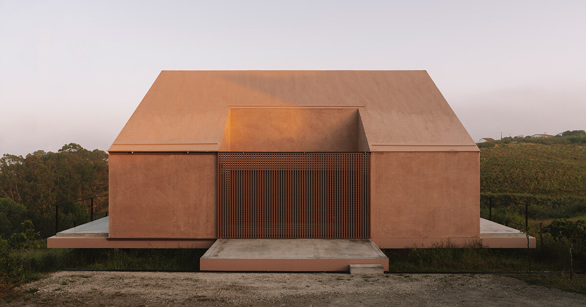 extrastudio suspends casa plaj above coastal slopes of portugal