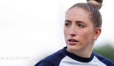 Caitlin Beevers looks on during a training session