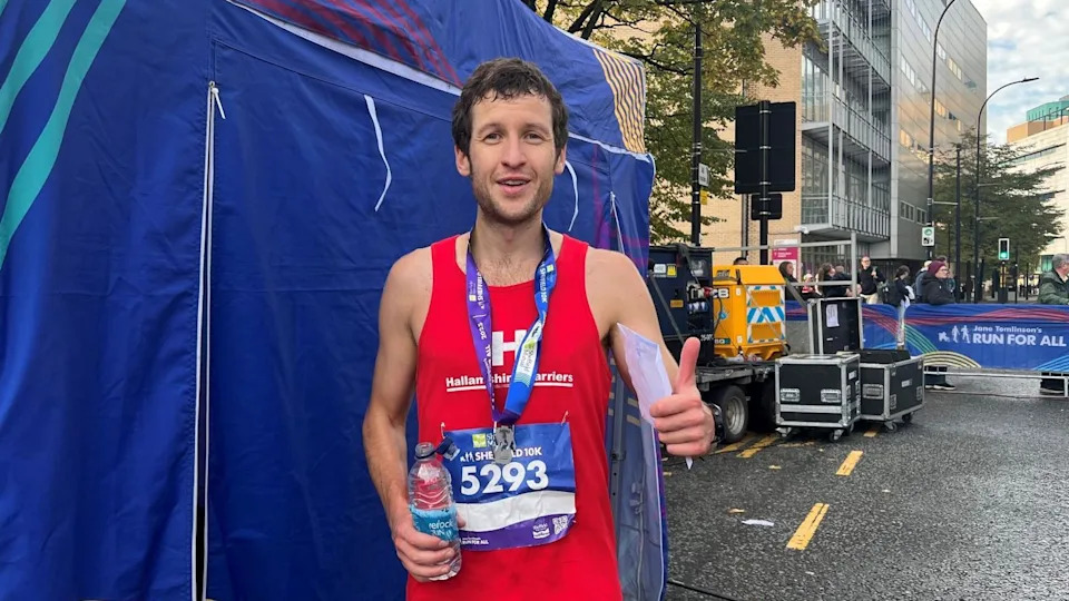 Euan Brown, 35, from London, after the Sheffield 10K wearing a red vest and black shorts
