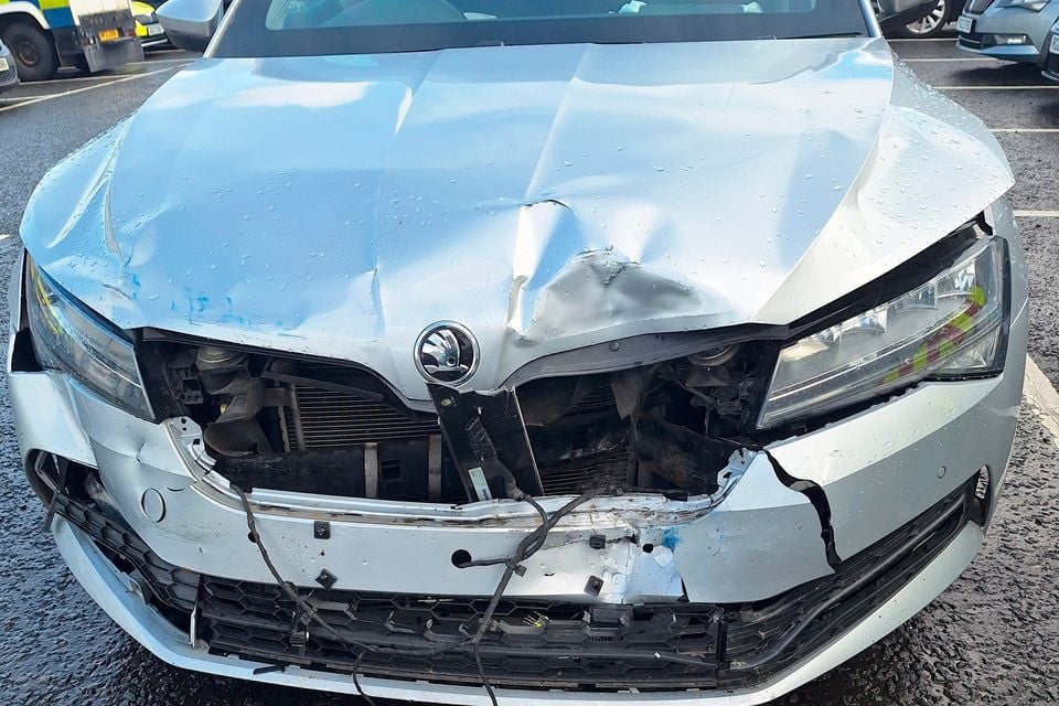 Two PSNI officers were injured after their poice car was rammed near Strabane on Saturday afternoon.