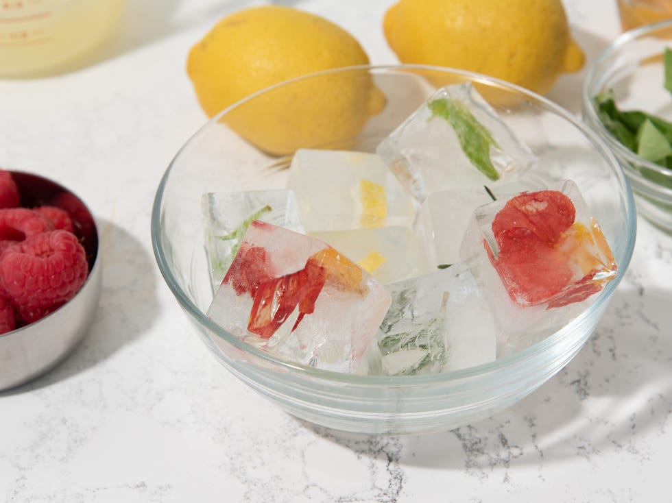 Meghan Markle fancy ice cubes meghan markle fancy ice cubes frozen with edible flowers, lemon slices, basil, rosemary sprigs