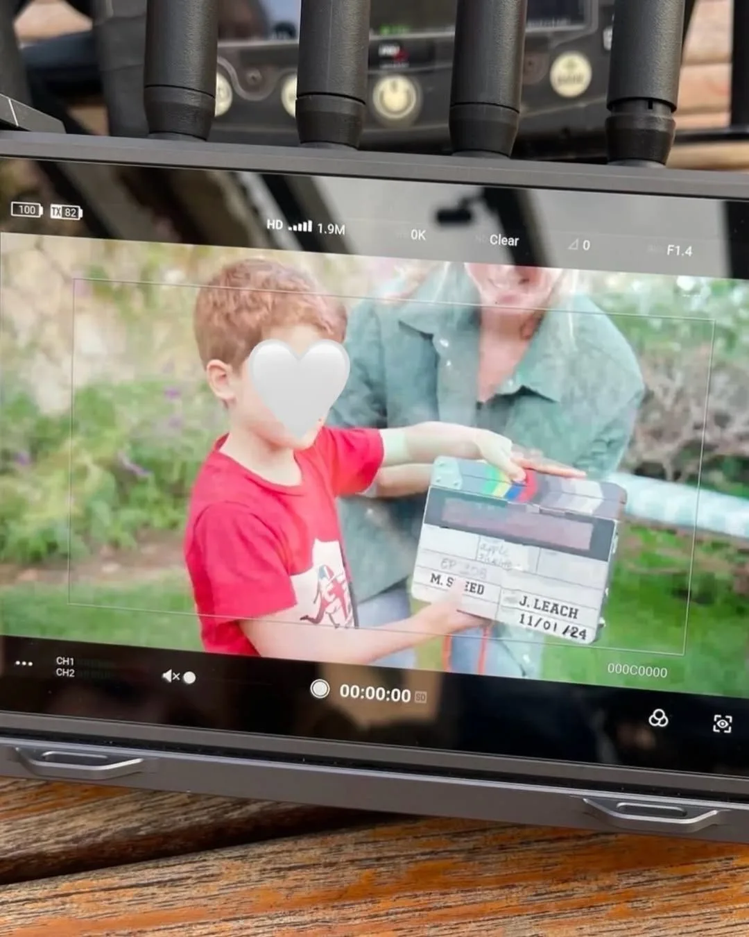 prince harry and meghan's son archie using the clacker during filming of with love, meghan
