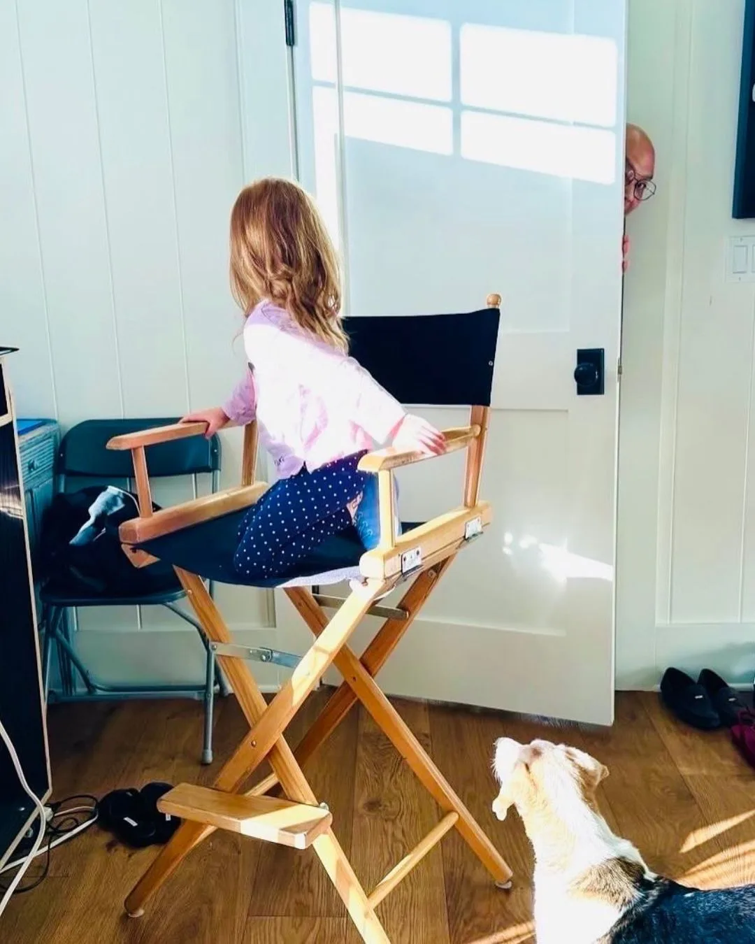 prince harry and meghan's daughter Lilibet in a director's chair