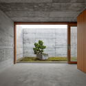 House with two Courtyards / BÜRO MÜHLBAUER - Interior Photography, Concrete