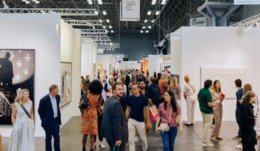 Attendees of the Armory Show's preview day shuffle around the booths in the Javits Center.
