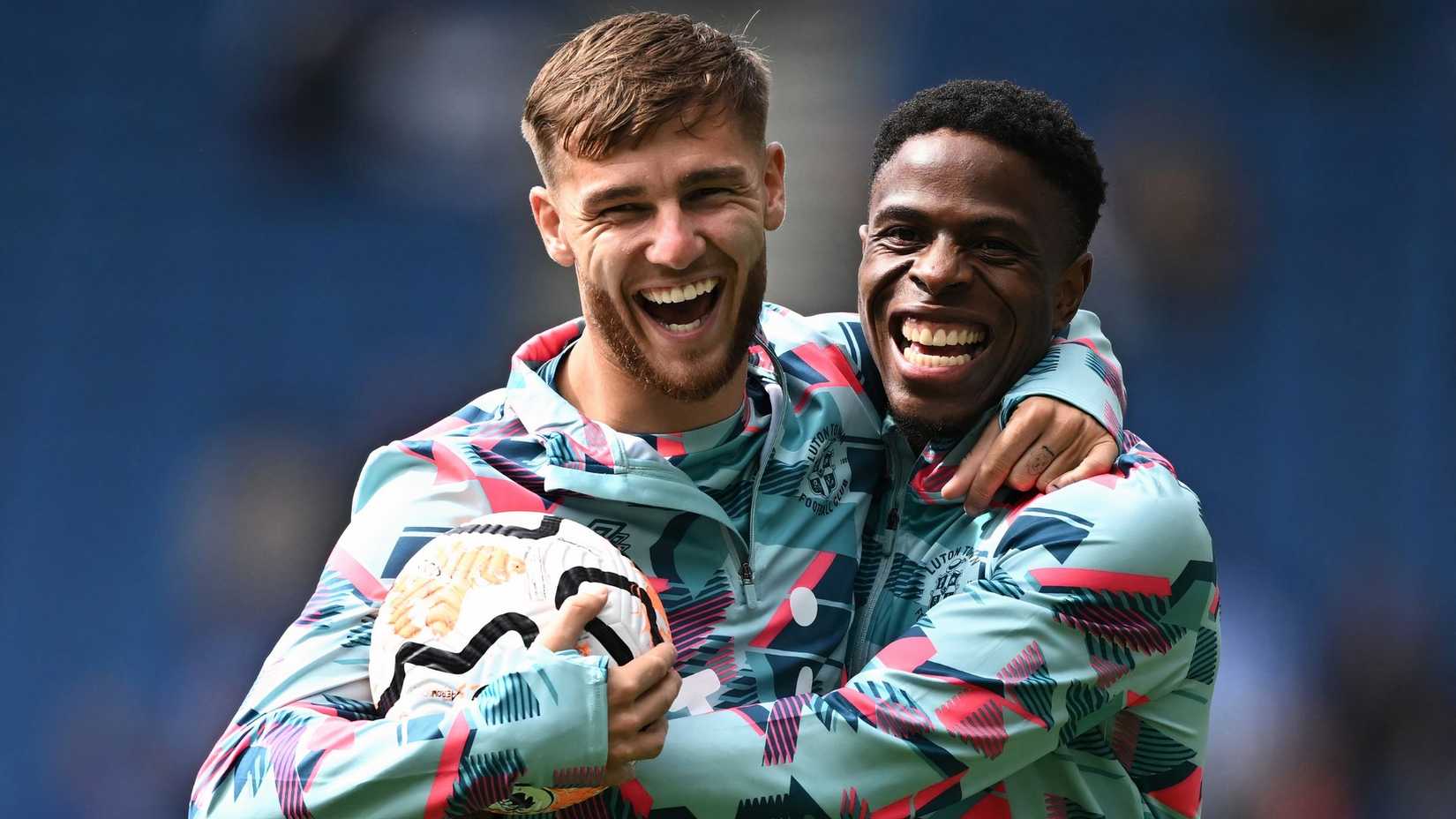  Luton Town's John Mcatee and Chiedozie Ogbene