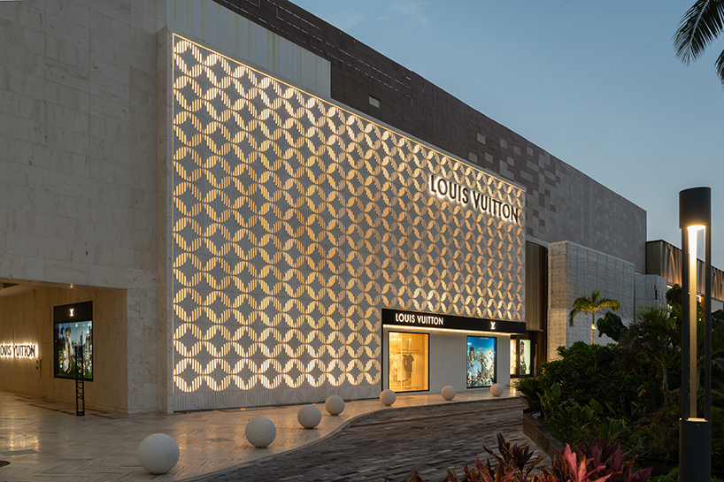 louis vuitton's cancun boutique unveils concrete facade with sculpted flower motif